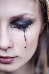 woman cries, close-up