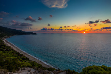Fototapeta premium Pefkoulia beach Lefkada at sunset / Pefkoulia beach near the Agios Nikitas village on Lefkada, Greece 