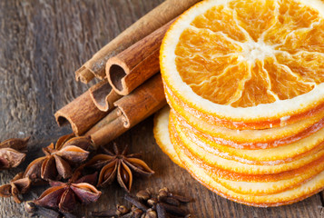 cinnamon sticks, anise and dried orange slices
