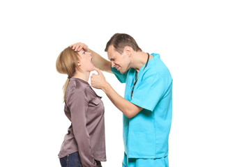 male doctor examines a female patient. isolated on white background