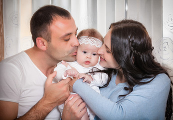 image of a happy family of three