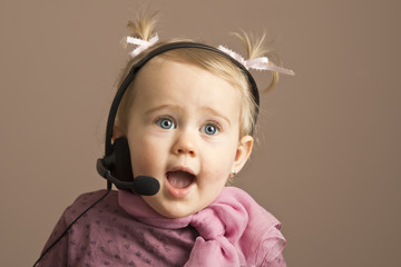 Funny baby girl talking on telephone - obrazy, fototapety, plakaty