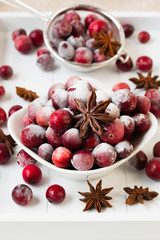 Fresh cranberries coated of sugar powder.