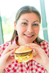 happy beautiful girl in the restaurant and fast food