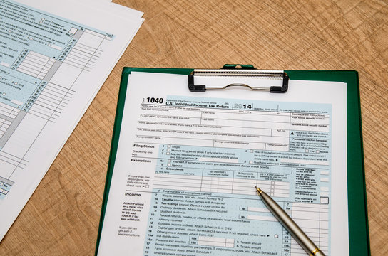 1040 tax return form  on wooden table