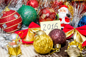 Christmas balls decoration on background. Happy New Year 2016