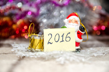 2016 text with toy Santa Claus