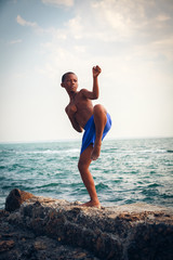 Young boy training karate