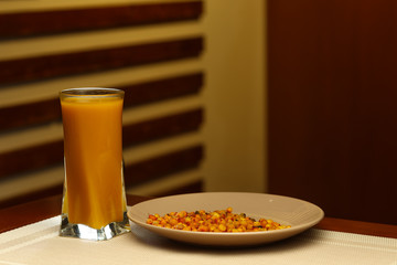 Glass of sweet mors and plate with ingredients © Mrakor