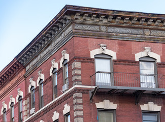 Old red brick building in the city of New York.