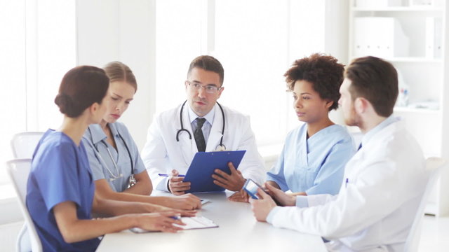 group of doctors meeting at hospital office