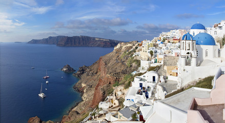 Santorini - The Oia panorama and the Therasia island in the background.