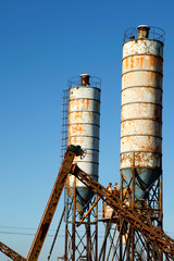 Concrete mixing tower. Concept of on-site construction facility.