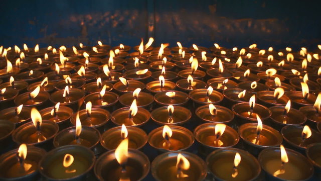 Large group of Candles at Buddhist temple. Close up capture