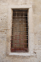 Fototapeta na wymiar Barred Window in Lecce