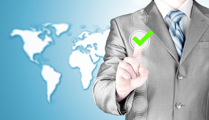 business man touching, pressing modern button with green ticking Check Box