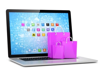 laptop and  shopping pags on white background