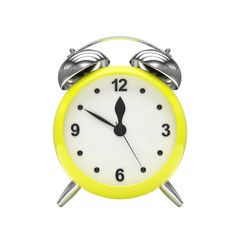 Yellow alarm clock on white