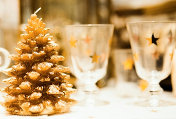  Christmastime table setting with golden festive decorations