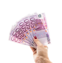 hand holding 500 euro money isolated on white background