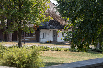 Fototapeta na wymiar Old wooden white house in Lanckorona in Poland
