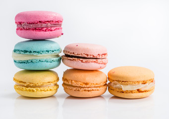 Colorful and tasty French cookies Macarons on white background