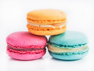 Colorful and tasty French cookies Macarons on white background