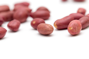 Peanuts on a white background. close