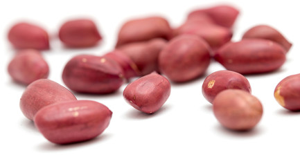 Peanuts on a white background. close