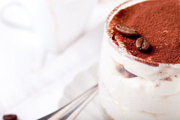 Tiramisu dessert in a glass. Traditional Italian.