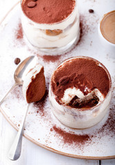 Tiramisu dessert in a glass. Traditional Italian.
