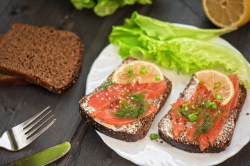 Sandwich with salmon for breakfast