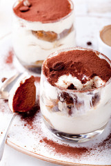 Tiramisu dessert in a glass. Traditional Italian.