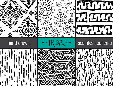 Set of six hand drawn tribal seamless black and white patterns.