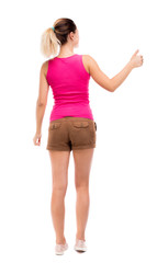 Back view of  woman thumbs up.