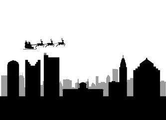 santa flying over the city of columbus