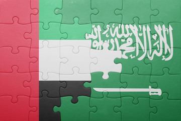 puzzle with the national flag of saudi arabia and united arab emirates