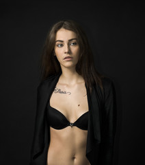 Beautiful girl portrait wearing black lingerie and cardigan