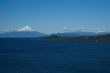 Snow capped Volcano Osorno (2,652 metres) on the edge of Llanquihue Lake in Southern Chile. Viewed from Puerto Varas.
