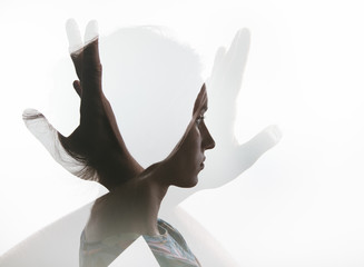 Creative double exposure with portrait of young girl