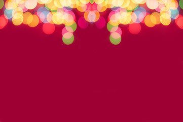 Christmas abstract red background with bokeh lights