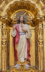 Granada -  Heart of Jesus statue on baroque altar of in Iglesia de san Anton 