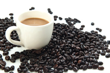 Coffee beans and cup