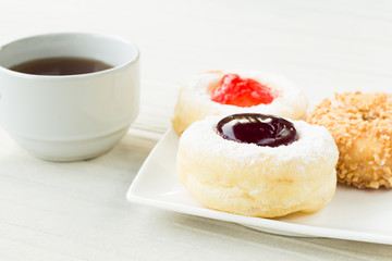 fresh baked donuts and tea