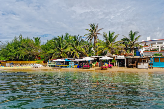 Fototapeta Shore of  tiny island of NGor in Atlantic ocean
