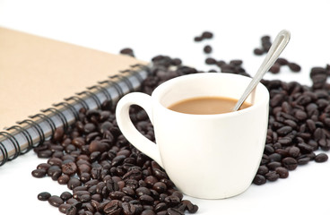 Coffee and book on white background