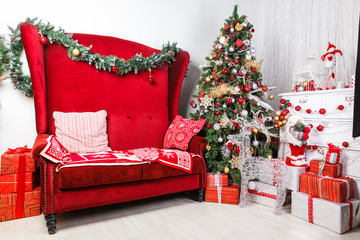 composition with red chair and Christmas tree