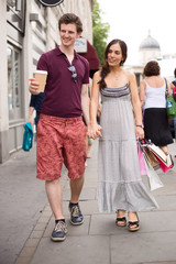 couple enjoying a day out walking round the city