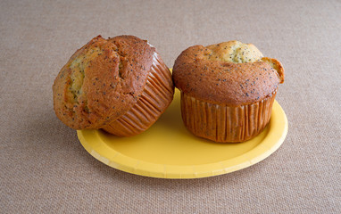 Two lemon pepper breakfast muffins on a plate