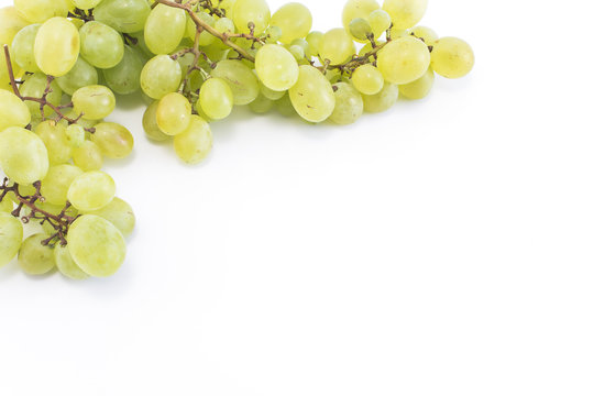 Green grapes on a white background